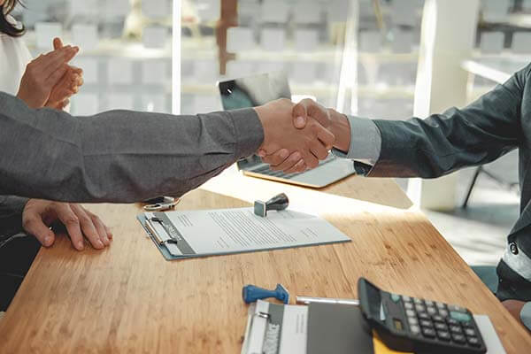 Business people shaking hands